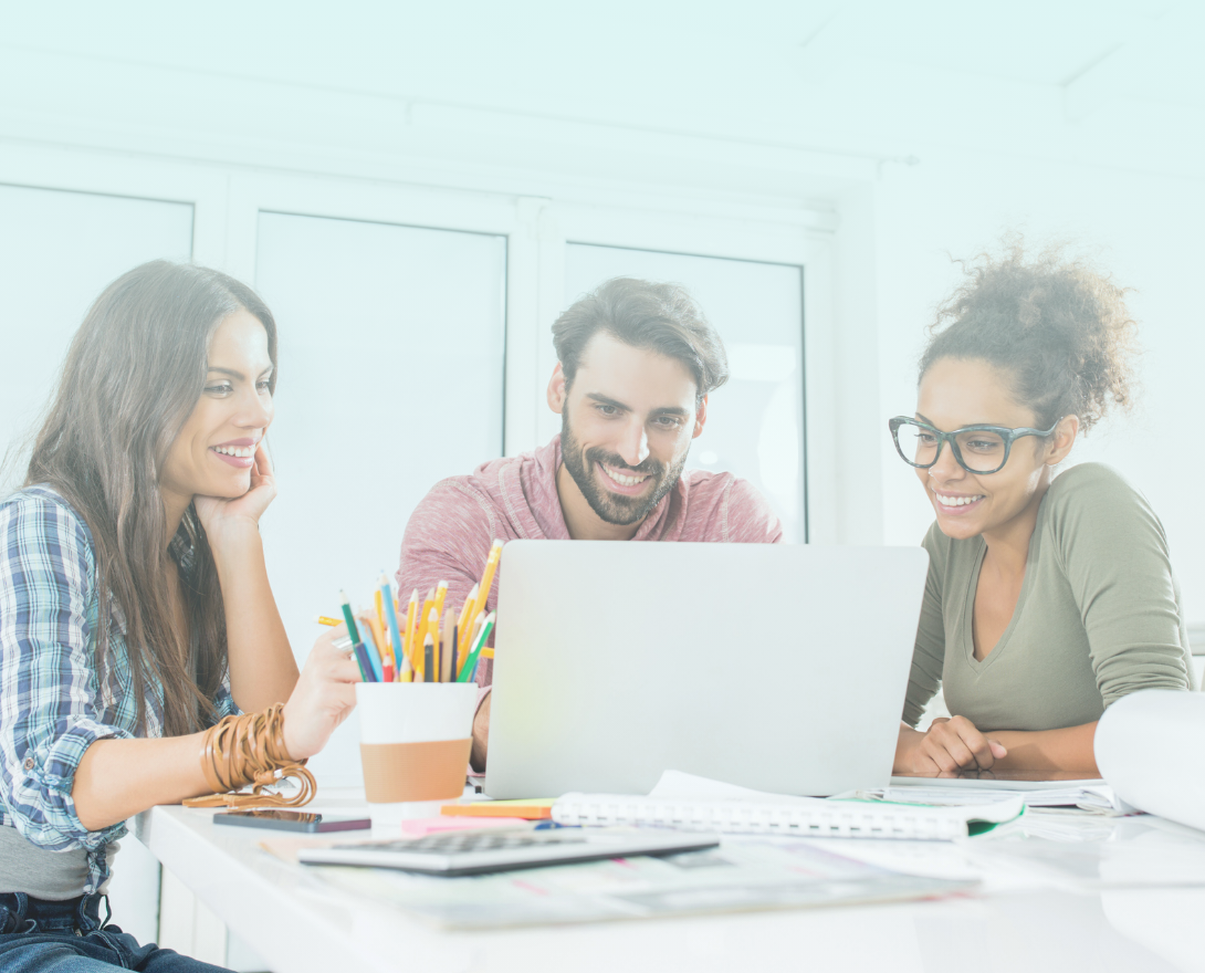 A district human resources (HR) team of a woman, a man, and another woman wearing glasses are working together using the Torace Standard plan on a shared laptop. A district human resources (HR) team of a woman, a man, and another woman wearing glasses are working together using the Torace Standard plan on a shared laptop.