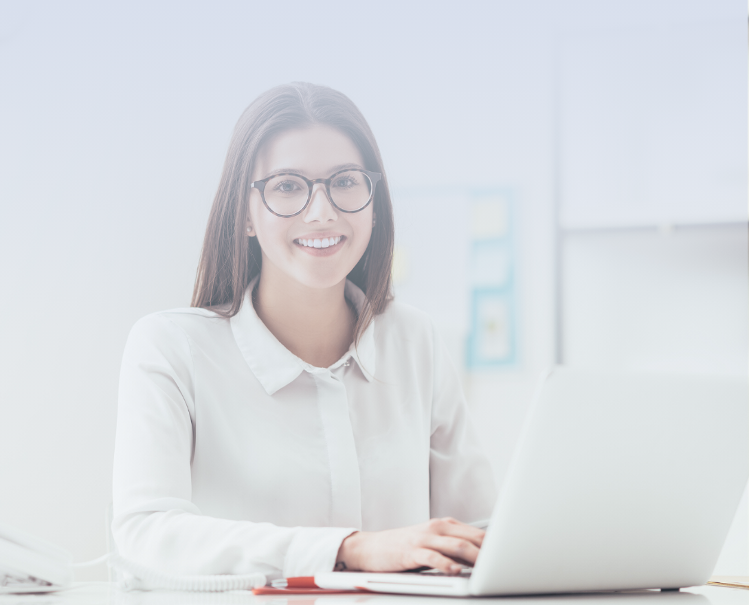 A female university coordinator wearing glasses and white shirt using Torace Starter on her laptop computer. A female university coordinator wearing glasses and white shirt using Torace Starter on her laptop computer.